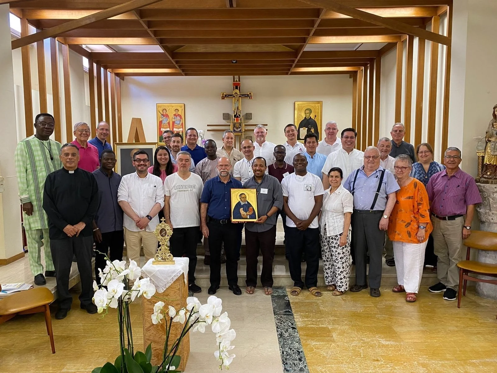 Members of the Congregation of Jesus and Mary gathered in a chapel