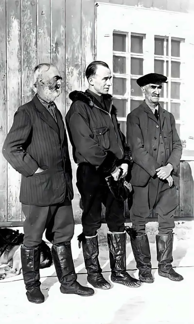 Mgr Labrie with two men on the North Shore